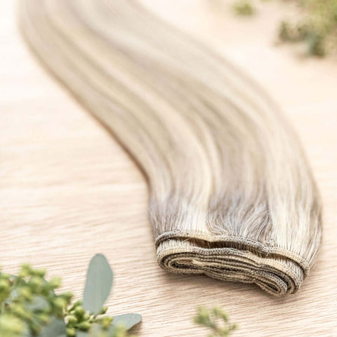 ALDER MACHINE WEFT 50g Alder machine weft is a 22" piano weft featuring natural-toned level 7 ash and neutral level 10 warm blonde. These machine wefts offer the highest weft density, along with the flexibility to be custom sized, colored, and cut accordi