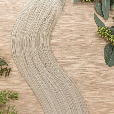 ASPEN NATURAL TAPE Aspen weft is a 22" weft featuring natural-toned level 10 ash platinum blonde. Our natural tape hair extensions are carefully crafted to ensure a natural appearance and seamless blending. The hair is placed on the outside of the tape, a