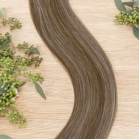 CYPRESS NATURAL TAPE Cypress weft is a 22" piano weft featuring natural-toned level 2 ash and neutral level 8 warm blonde. Our natural tape hair extensions are carefully crafted to ensure a natural appearance and seamless blending. The hair is placed on t