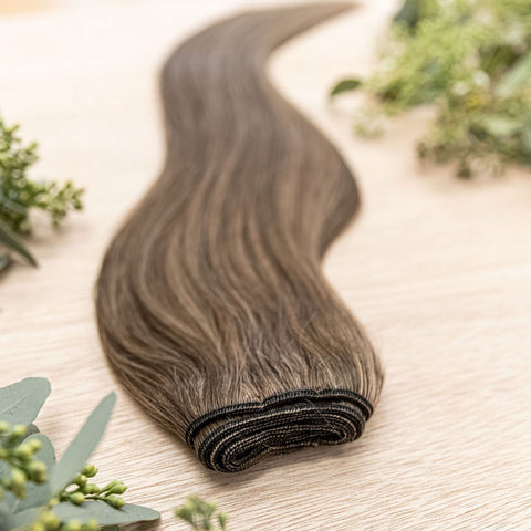 HICKORY MACHINE WEFT 50g Hickory machine weft is a 22" piano weft featuring natural-toned level 2 brown and neutral level 8 warm blonde. These machine wefts offer the highest weft density, along with the flexibility to be custom sized, colored, and cut ac
