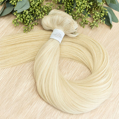 MAPLE CLIP IN Maple clip-in hair extensions are 22 inches in length and made of a gorgeous weft of natural-toned level 9 true warm blonde. They provide instant density and length when applied to the hair. These clip-in extensions can be customized in term