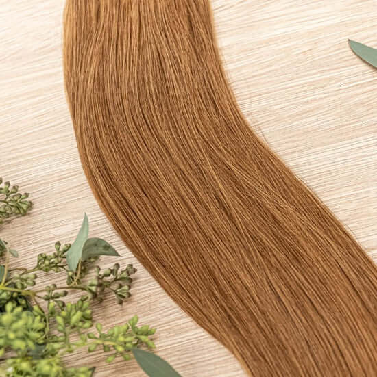 26 INCH CUSTOM NATURAL TAPE NOW SOLD IN 100 GRAM BUNDLES WITH 2 PACKS IN EACH ORDER. OUR NATURAL TAPE HAIR EXTENSIONS ARE SEAMLESS AND BLENDABLE. OUR HAIR IS ON THE OUTSIDE OF THE TAPE ALL THE WAY TO THE ROOT TO ENSURE IT LOOKS AND BLENDS NATURALLY. OUR C