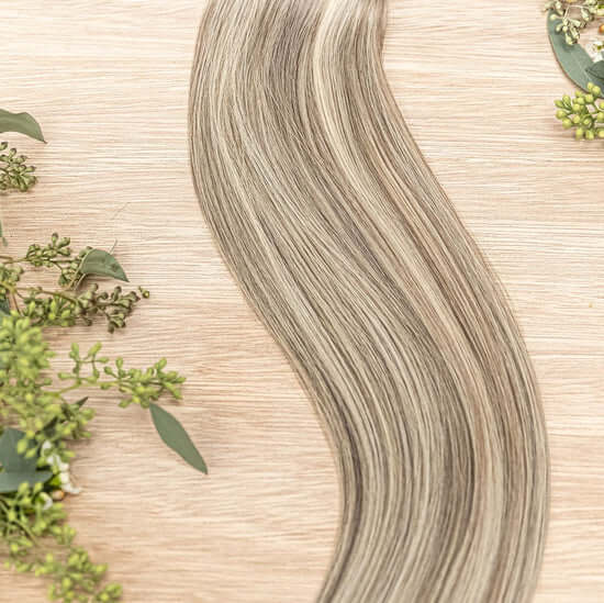 26 INCH CUSTOM NATURAL TAPE NOW SOLD IN 100 GRAM BUNDLES WITH 2 PACKS IN EACH ORDER. OUR NATURAL TAPE HAIR EXTENSIONS ARE SEAMLESS AND BLENDABLE. OUR HAIR IS ON THE OUTSIDE OF THE TAPE ALL THE WAY TO THE ROOT TO ENSURE IT LOOKS AND BLENDS NATURALLY. OUR C