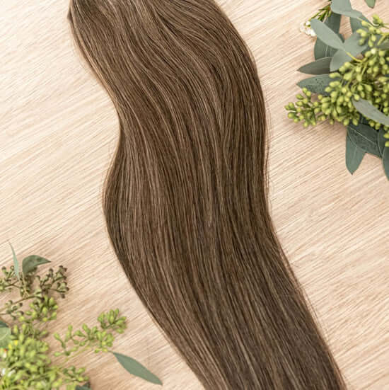 26 INCH CUSTOM NATURAL TAPE NOW SOLD IN 100 GRAM BUNDLES WITH 2 PACKS IN EACH ORDER. OUR NATURAL TAPE HAIR EXTENSIONS ARE SEAMLESS AND BLENDABLE. OUR HAIR IS ON THE OUTSIDE OF THE TAPE ALL THE WAY TO THE ROOT TO ENSURE IT LOOKS AND BLENDS NATURALLY. OUR C