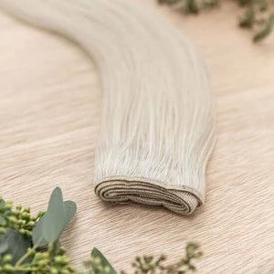 26 INCH CUSTOM MACHINE NOW SOLD IN 100 GRAM BUNDLE PACKS WITH 2 WEFTS IN EACH ORDER. CUSTOM ORDERS MAY TAKE 2 WEEKS FOR ORDERING PLUS SHIPPING TO ARRIVE. MACHINE WEFTS GIVE THE HIGHEST WEFT DENSITY, ALONG WITH THE ABILITY TO BE CUSTOM SIZED, COLORED AND C